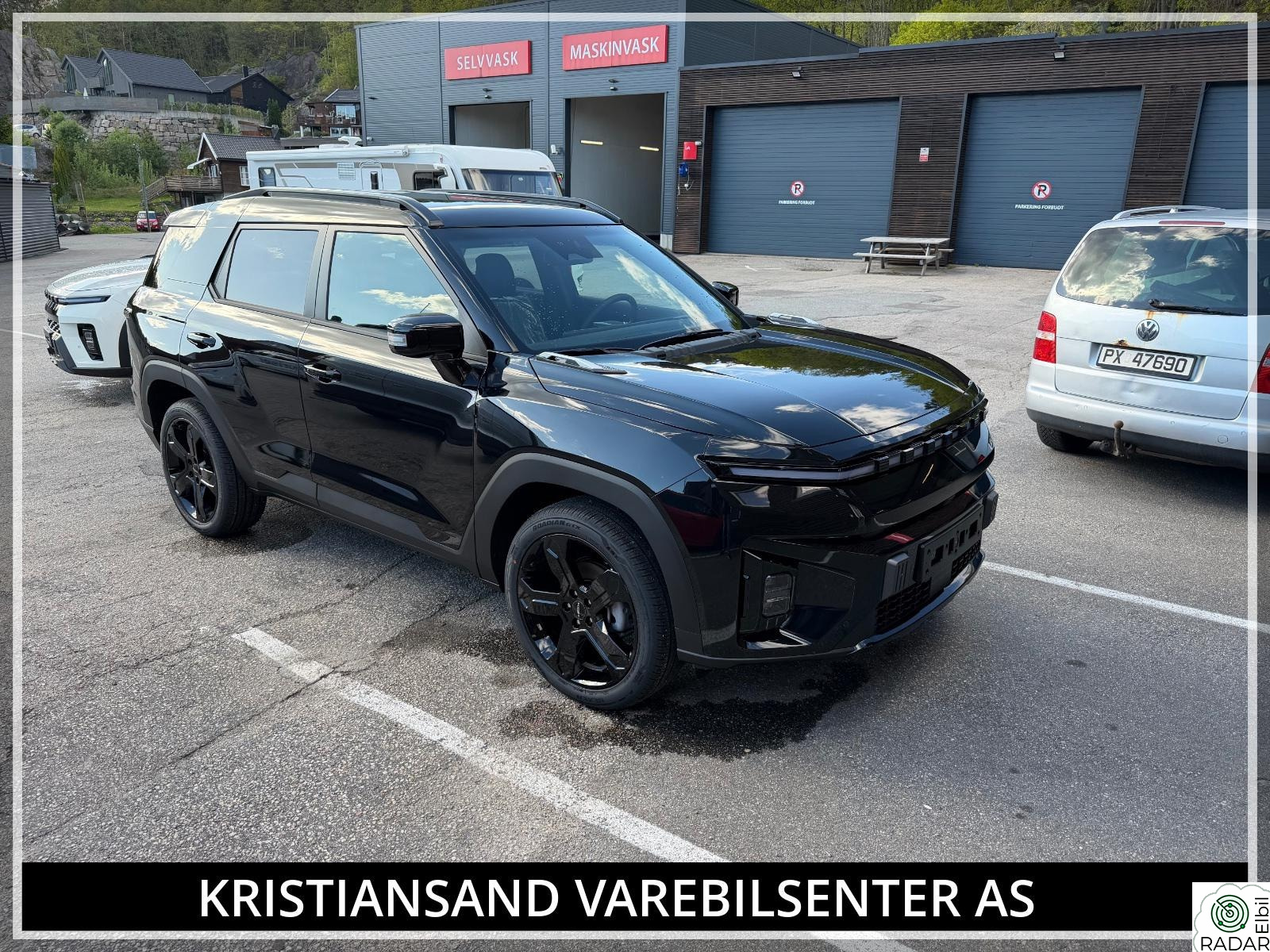 KG MOBILITY TORRES EVX Black Edge